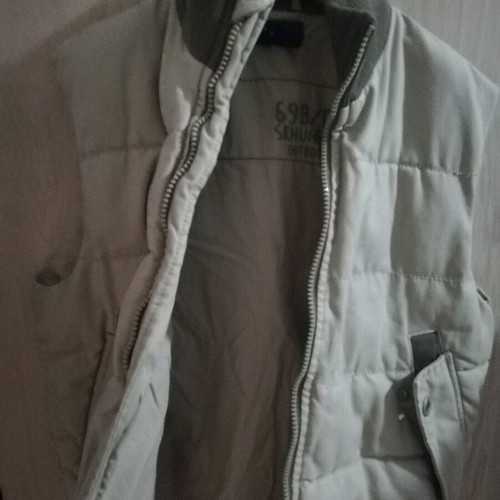 Children's sleeveless beige jacket like new for ages 10-12