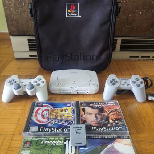 Sony PS One Slim console bundle with 2 controllers, official bag & 4 games