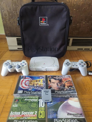 Sony PS One Slim console bundle with 2 controllers, official bag & 4 games