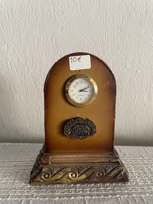 Vintage tabletop clock used, leather and carved wood