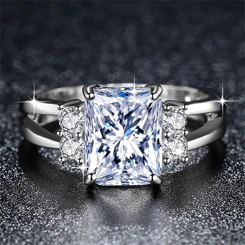 Ring with white zircon new, silver metal with rhodium plating
