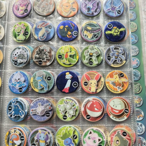 Pokemon collectible caps 213 pieces like new
