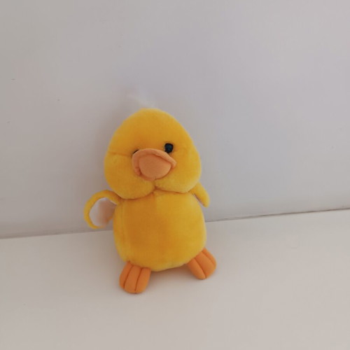 Small yellow plush duck