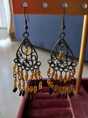 Dangling earrings like new with orange details in boho style