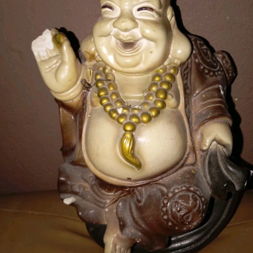 Budai statue used, symbol of happiness and prosperity