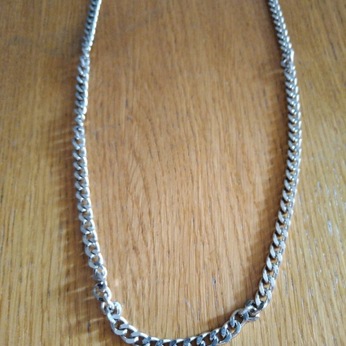 Long chain necklace used