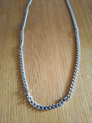 Long chain necklace used