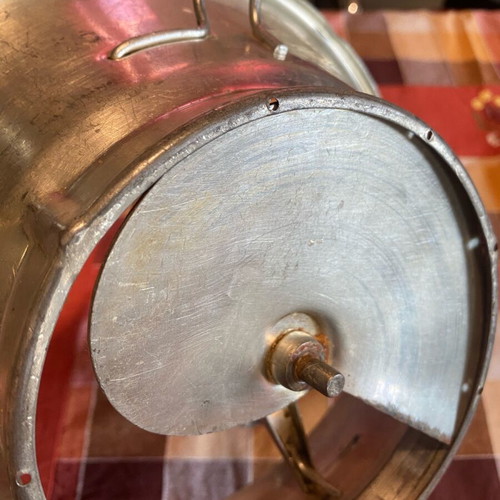 Manual grain mill used with two blades