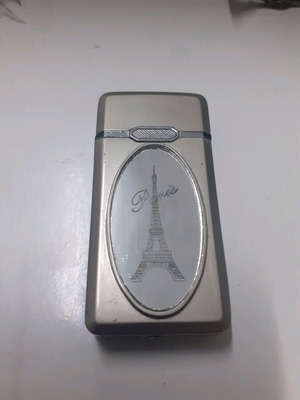 Windproof lighter used, gas, non-functional