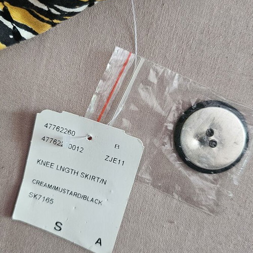 Twenty One cotton skirt new, size S, cream with mustard and black flowers