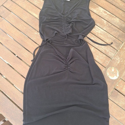 Black tight short dress with belly cutout like new