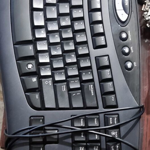 Microsoft computer keyboard used with two missing keys