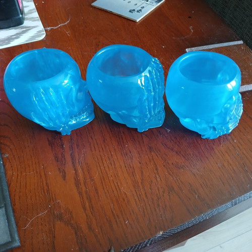 Set of 3 handmade skull-shaped tealight holders hear no evil, see no evil, speak no evil