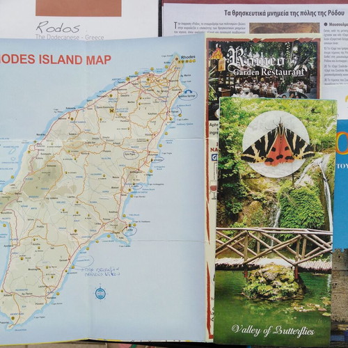Package of used maps, books and travel brochures for Rhodes and Halki