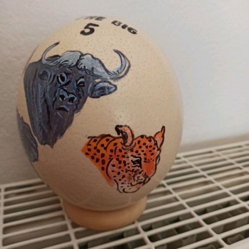 Ostrich egg painted like new with stand and painted animals