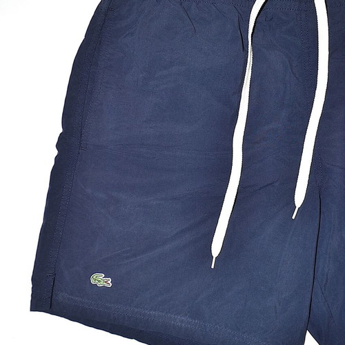 Lacoste swim shorts size 4, blue and red