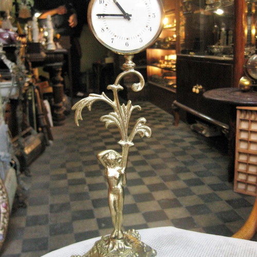Brass tabletop clock used with decorative base