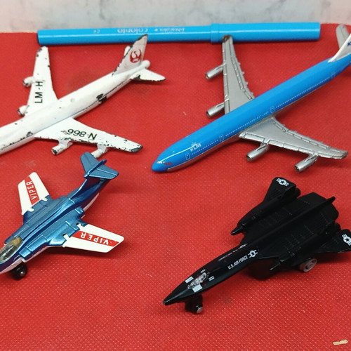 Iron toy airplanes set of 4 used, including Greek, English and Chinese