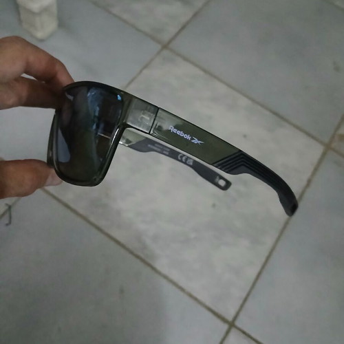 Sunglasses Reebok and Hawkers used, one sports mask with scratches