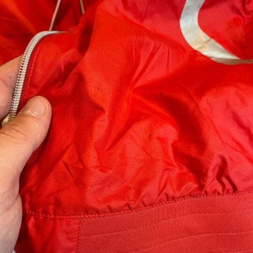 Ducati team jacket used, moderate condition with holes and stains
