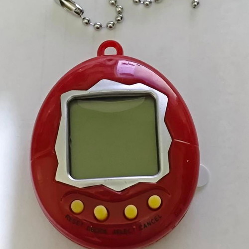 Retro digital virtual pet with chain, like new