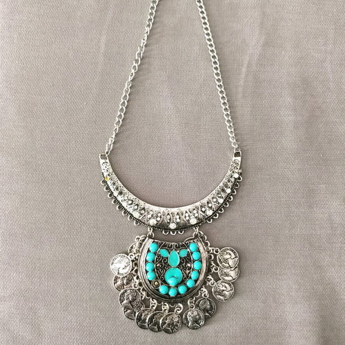 Steel necklace like new, missing one turquoise stone