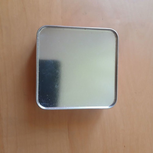 Football coasters in metal box, like new