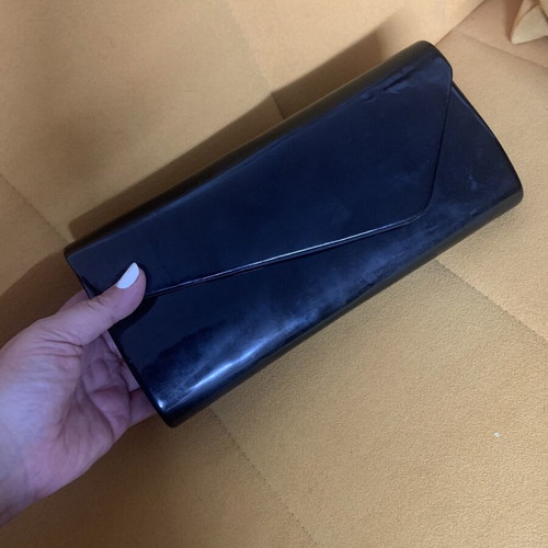 Envelope bag used, black crossbody with glossy patent texture