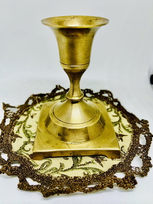 Vintage brass candlestick used with classic design