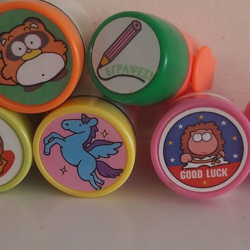 Collection of 1990s children's rubber stamps with original ink