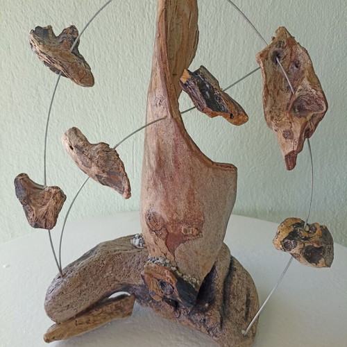 Handmade table decor with driftwood and metal design