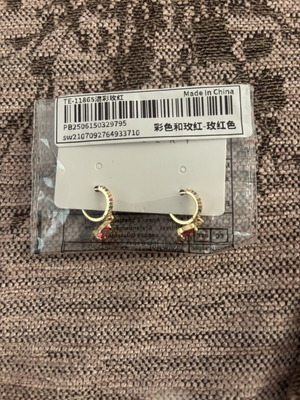 Earrings new, set with steel and silver designs