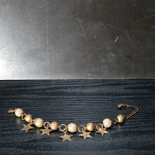 Bronze bracelet with star charms