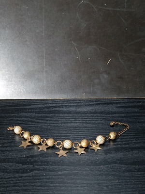 Bronze bracelet with star charms