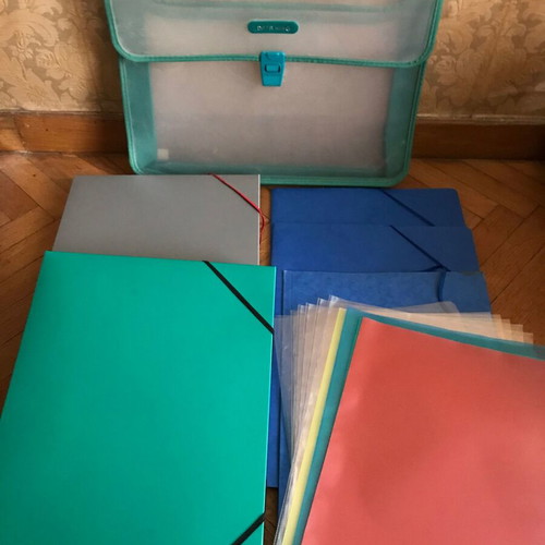 Plastic bag, thick plastic folders, cardboard folders and slides like new