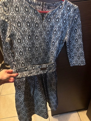 Silver dress used with belt at the waist