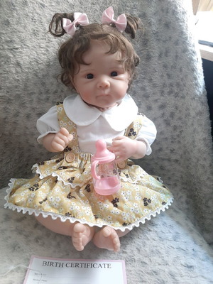 Reborn doll new with cloth body