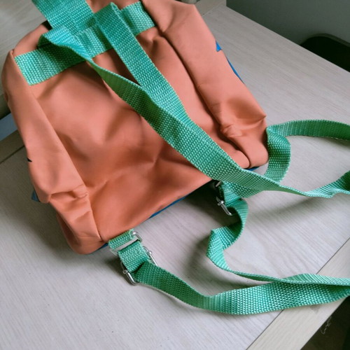 Backpack with ecological label like new, green and orange