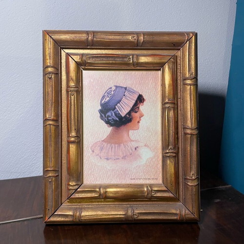 Golden frame used, wooden carved