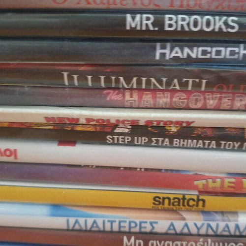 DVD pack of 55 new, 40 in hard case and 15 in paper