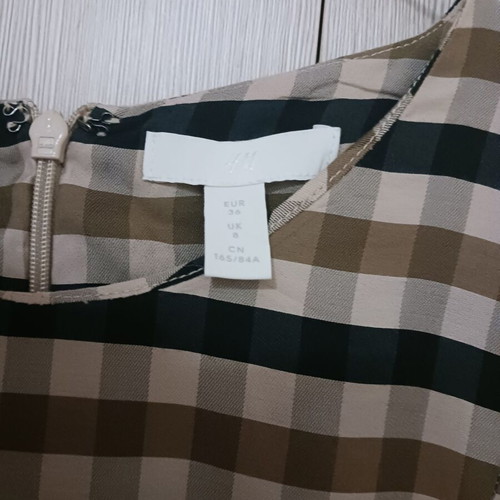 Dress H&M with puff sleeves size 36 like new beige and black