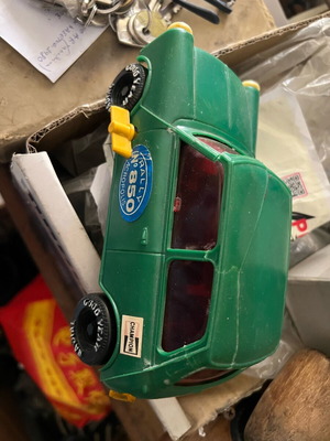 Mini Cooper wind-up toy used, with some broken parts
