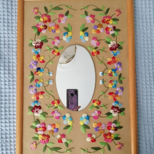 Embroidered frame used with mirror