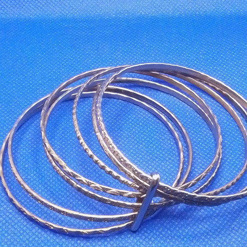 Metal bracelet with 7 rings used