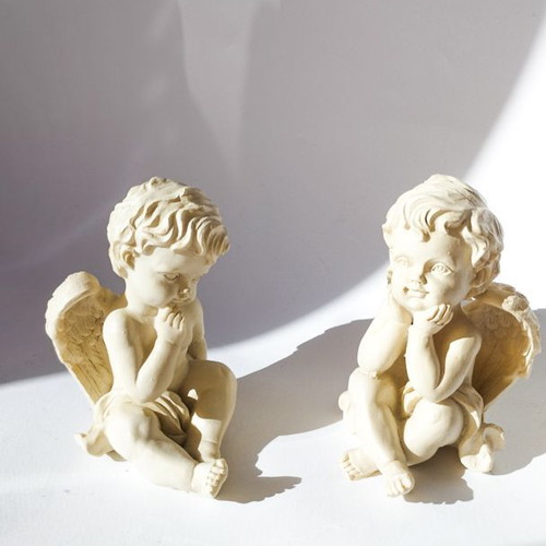 Vintage set of 2 resin cherubs in classic Renaissance style like new