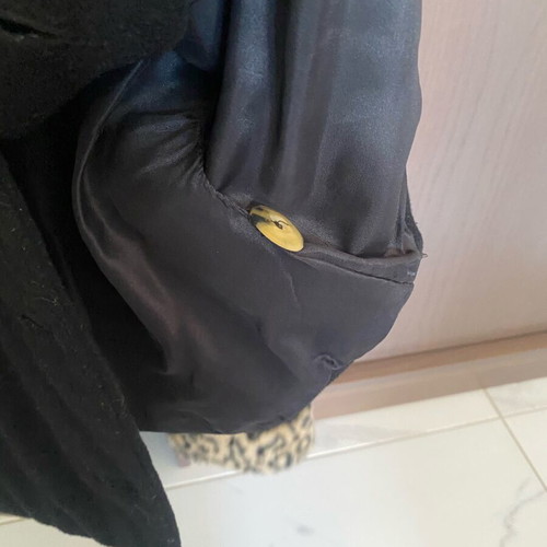 Women's jacket used black with leopard print sleeves