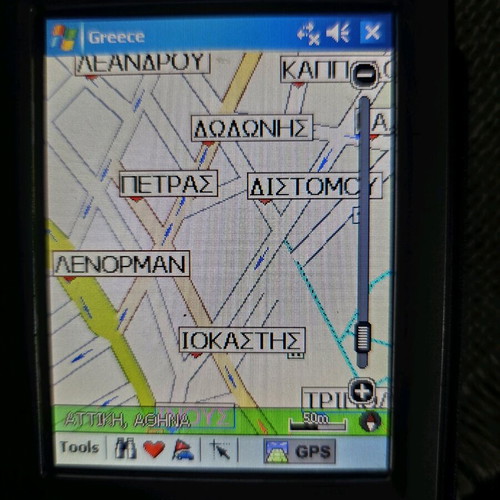 Pocket PC Navigator mio used with mounting base and charging cable