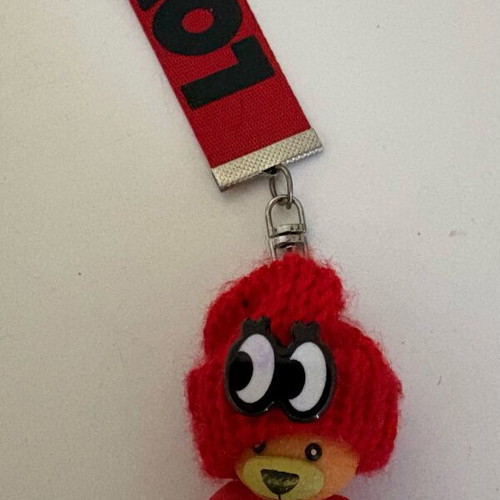 Set of 4 plush keychains with emoji, panda and love doll