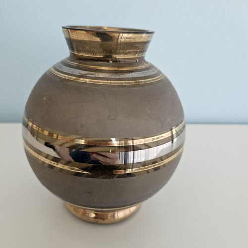 Decorative vase with gold details like new