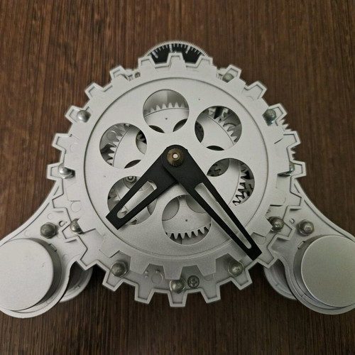 Decorative clock used, plastic with batteries, missing one battery cover